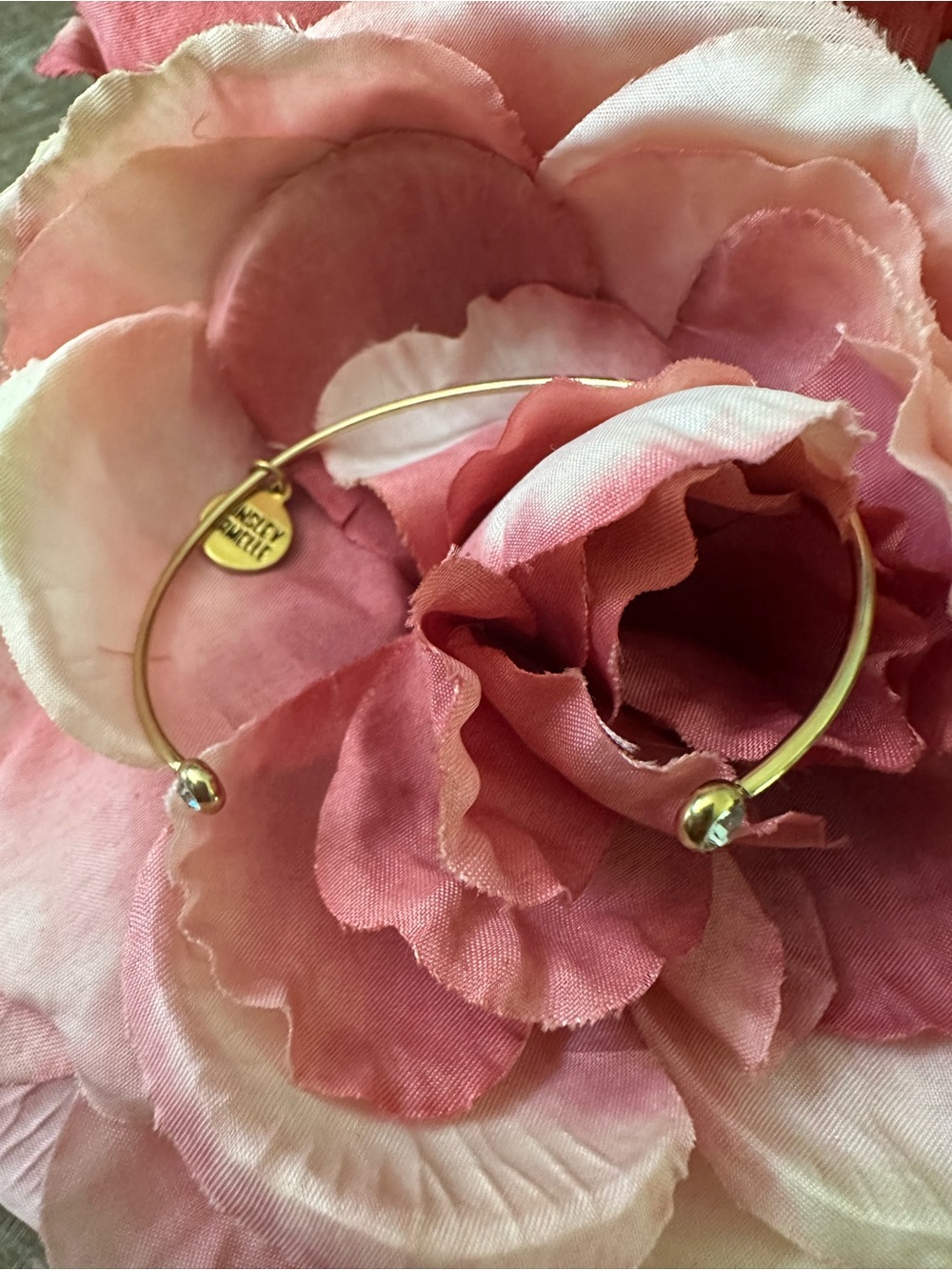 Kinsley Armelle Gold Open Bangle with Pink Accents